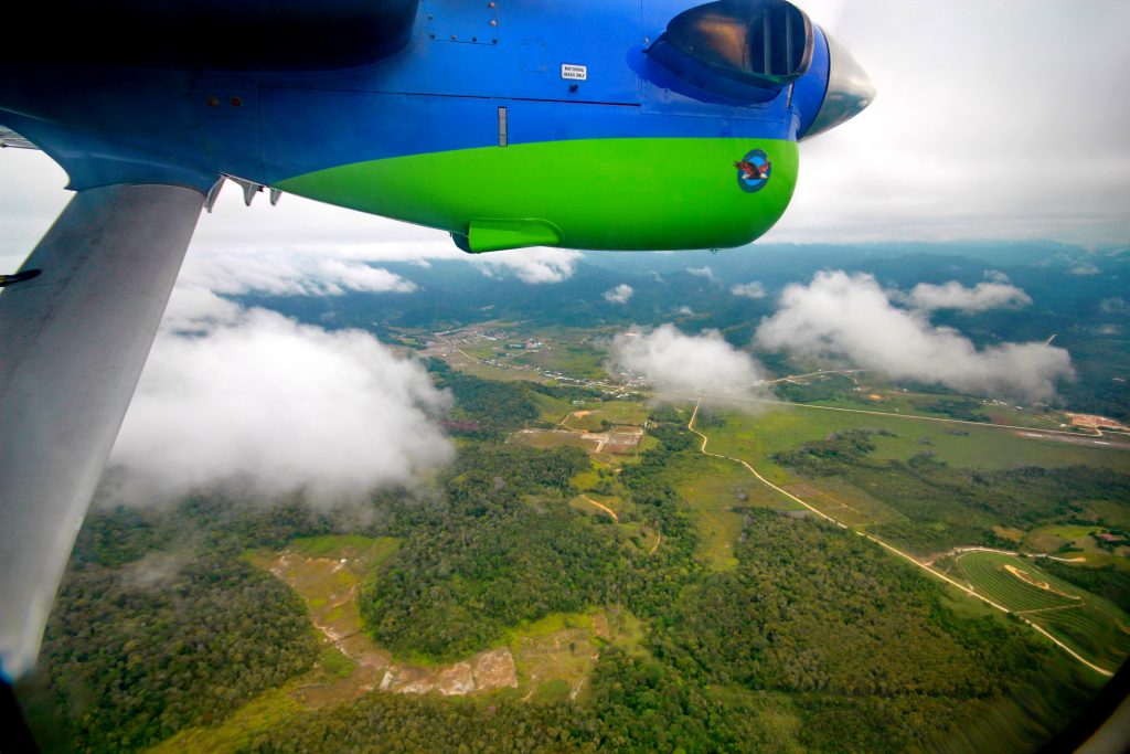 The aircrafts crosses the ridges and enters the Bario plateau.